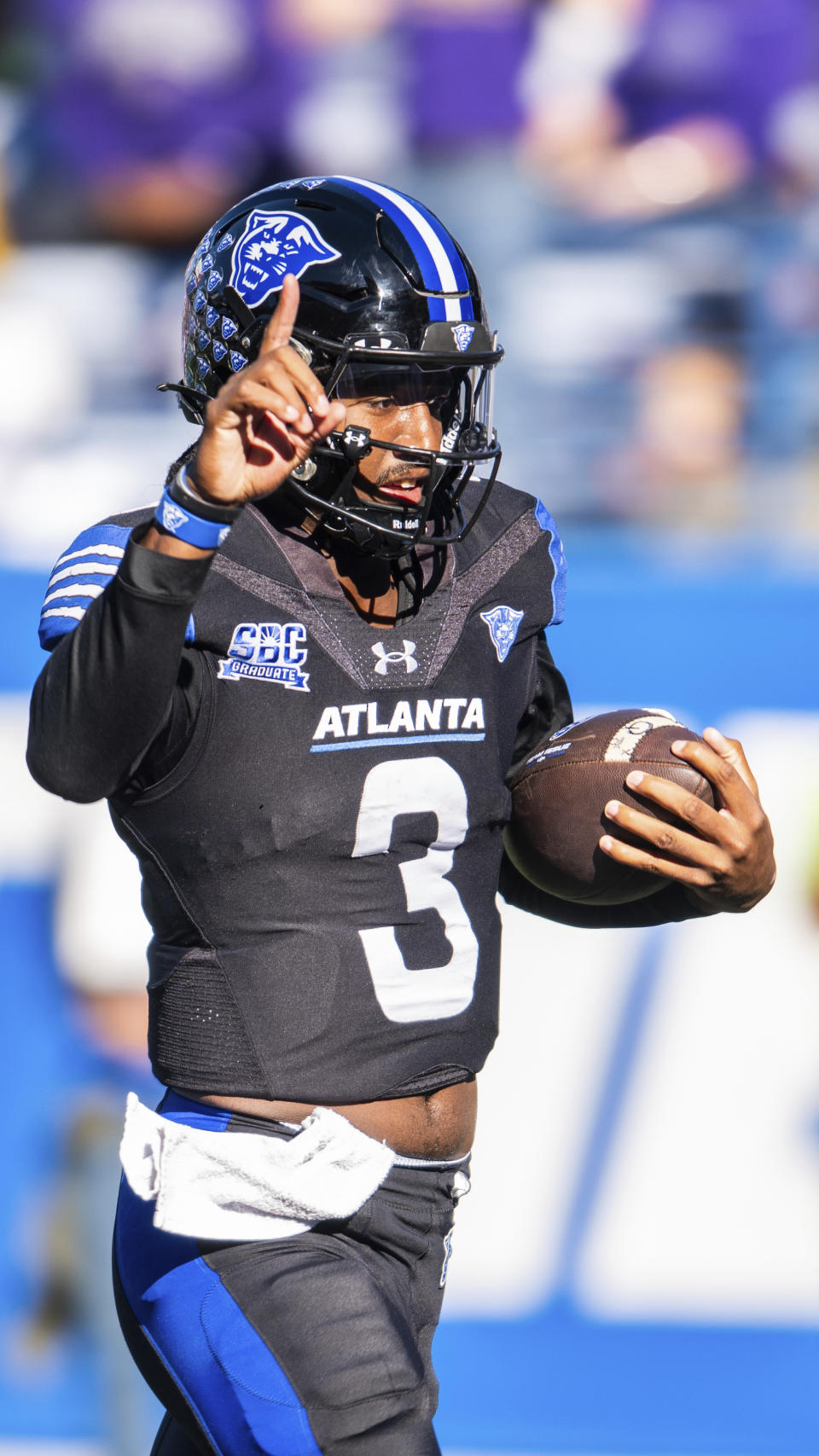 Georgia State quarterback Darren Grainger gestures after scoring a rushing touchdown against James Madison in the first half of an NCAA college football game against Saturday, Nov. 4 2023, in Atlanta. (AP Photo/Hakim Wright Sr.)