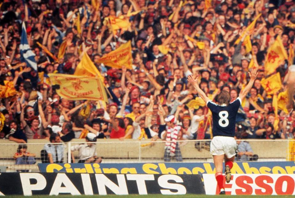 Kenny Dalglish celebrates after scoring Scotland’s second goal in a 2-1 win over England at Wembley in 1977.