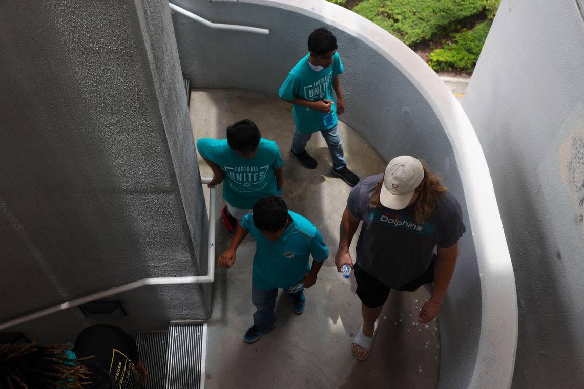 Blaise Andries, right, offensive lineman of the Miami Dolphins rookie class, walks with youth from the Islamic Center of Greater Miami in a historic walking tour of Downtown Miami on Wednesday, June 15, 2022 beginning with tour leaders at the History Miami Museum. Andries played at the University of Minnesota.