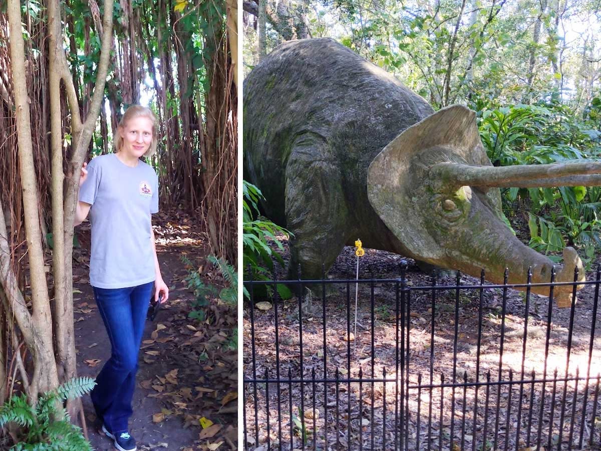 An image of a blonde woman posing next to a tree and a statue of a triceratops dinoasaur