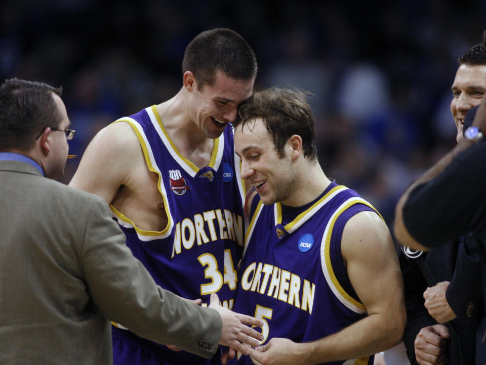 FILE - In this March 18, 2010, file photo, Northern Iowa forward Adam Kock (34) congratulates teammate Ali Farokhmanesh after an NCAA first-round college basketball game against UNLV, in Oklahoma City. This is the time of year that people will usually start tweeting at Ali Farokhmanesh. There will be Northern Iowa fans that remember his back-to-back buzzer-beaters to beat UNLV and Kansas and usher the Panthers to the Sweet 16 of the NCAA Tournament a decade ago. (AP Photo/Sue Ogrocki, File)
