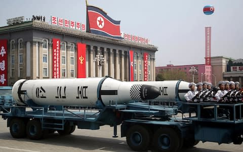  A submarine missile is paraded across Kim Il Sung Square during a military parade in Pyongyang, North Korea - Credit: AP