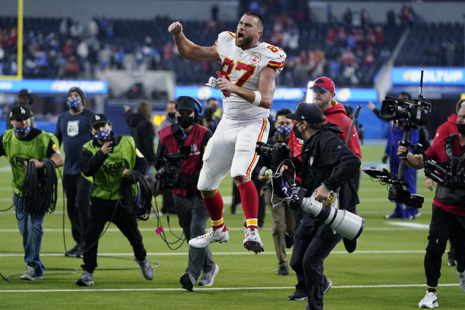 Kansas City Chiefs tight end Travis Kelce celebrates after the Chiefs defeated the Los Angeles Chargers in an NFL football game Thursday, Dec. 16, 2021, in Inglewood, Calif. The Chiefs won 34-28. (AP Photo/Marcio Jose Sanchez)