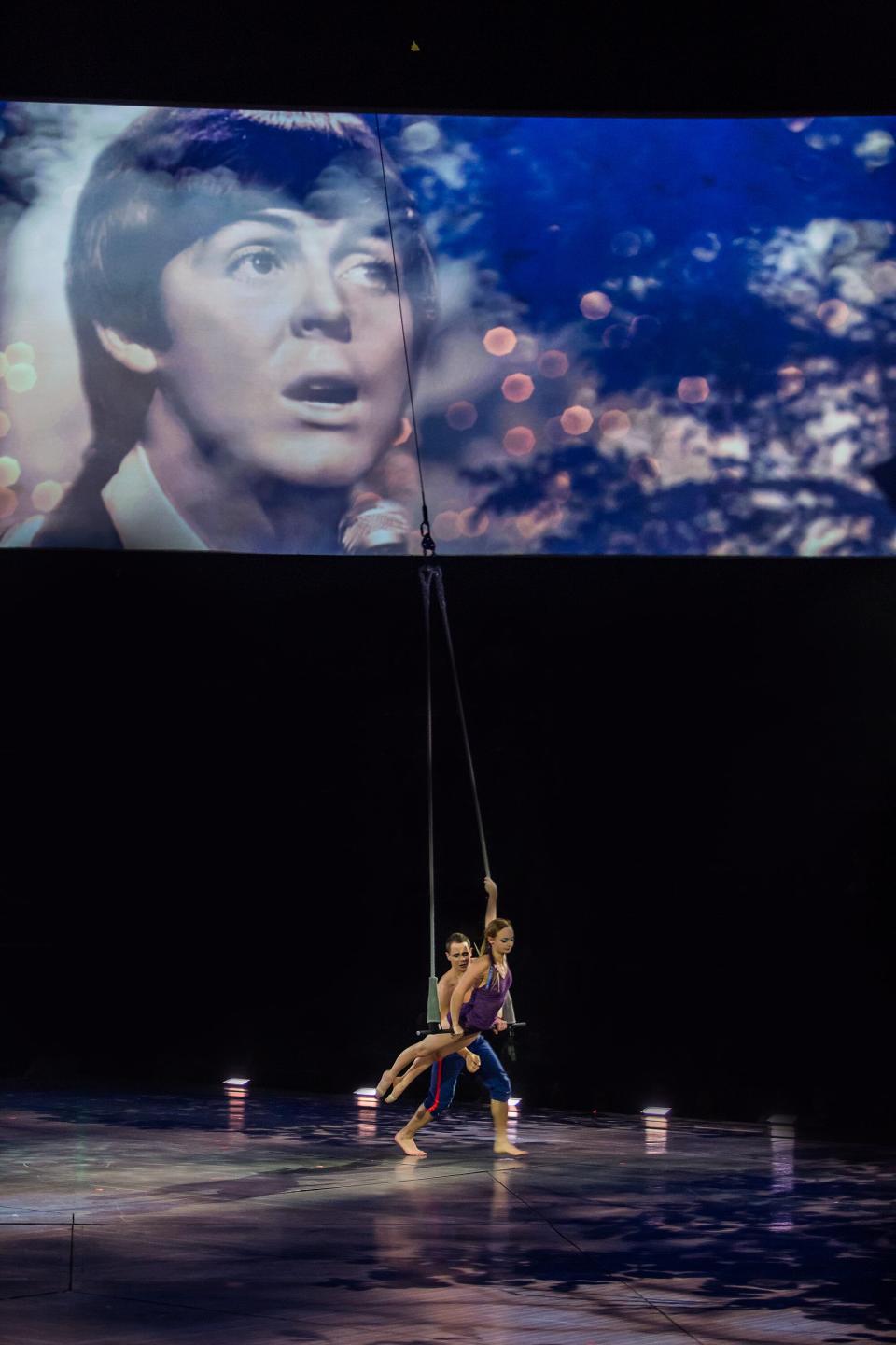 Trapeze specialists perform to "Yesterday" during The Beatles' Cirque du Soleil show, "Love," in Las Vegas.