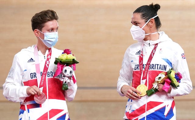 Great Britain’s Crystal Lane-Wright, left, was powerless to stop Dame Sarah Storey