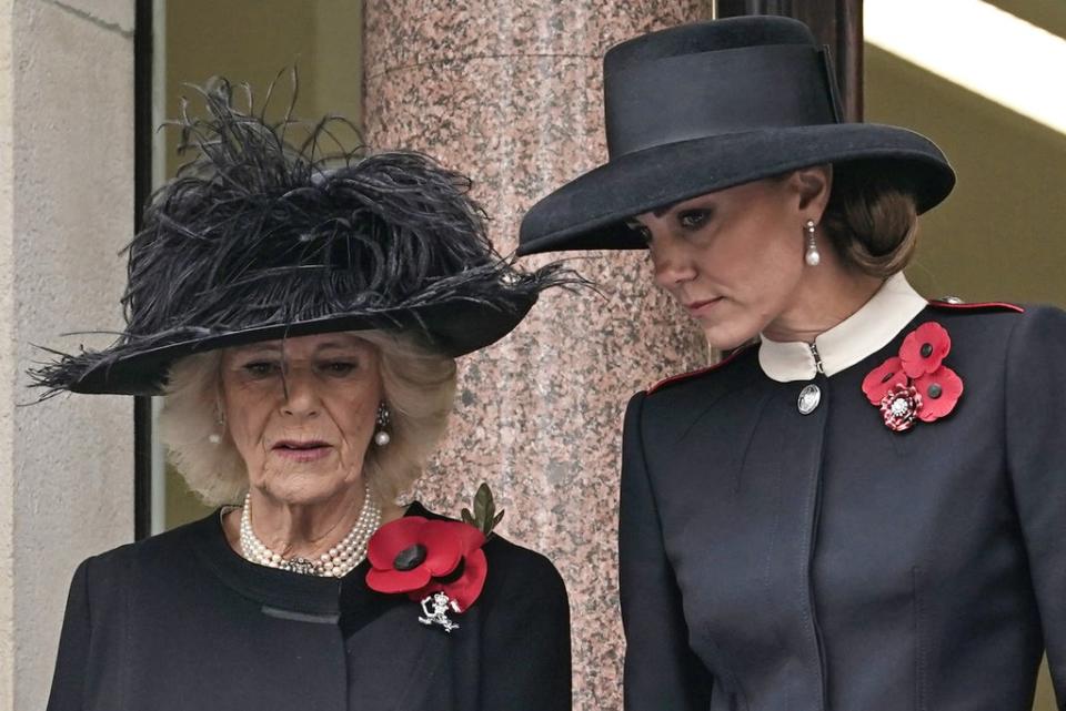 The Duchess of Cornwall, left, and Duchess of Cambridge on the balcony at the Remembrance Sunday service at the Cenotaph (Aaron Chown/PA) (PA Wire)