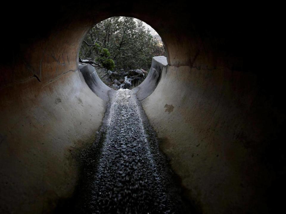 Rainwater flows down off Cape Town’s Table Mountain