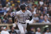 Colorado Rockies' Ryan McMahon watches his grand slam against the San Diego Padres during the first inning of a baseball game Friday, July 30, 2021, in San Diego. (AP Photo/Derrick Tuskan)