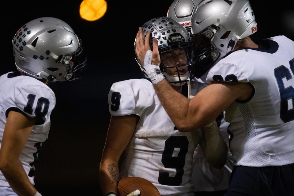 Reitz’s Roland Vera Jr. (9) is celebrated after scoring as the Reitz Panthers play the Castle Knights at John Lidy Field Friday, Sept. 22, 2023.