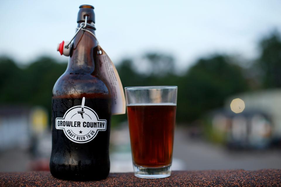 A 32-ounce beer from Growler Country, sold to-go at the craft beer market.
