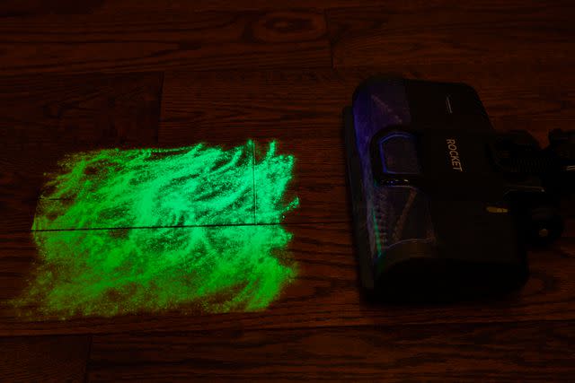 <p>People / Dera Burreson</p> A 'Before' photo of the Shark Pet Vacuum during the glow-in-the-dark powder test
