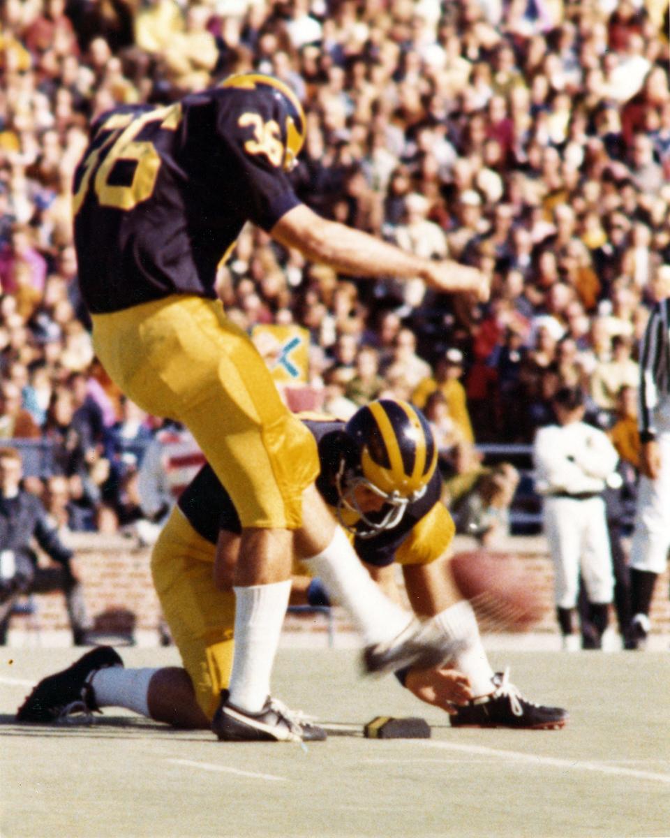 University of Michigan football placekicker Mike Lantry attempts a kick during one of the games he played in while attending the university from 1972-74.