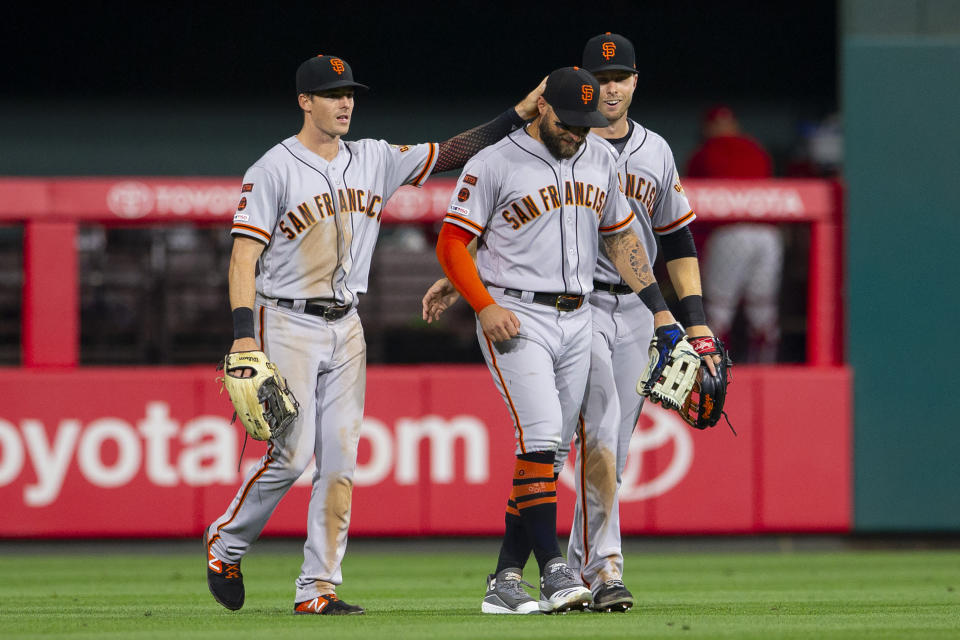 PHILADELPHIA, PA - JULY 31: Mike Yastrzemski #5, Kevin Pillar #1, and Austin Slater #53 of the San Francisco Giants celebrate after the game against the Philadelphia Phillies at Citizens Bank Park on July 31, 2019 in Philadelphia, Pennsylvania. The Giants defeated the Phillies 5-1. (Photo by Mitchell Leff/Getty Images)