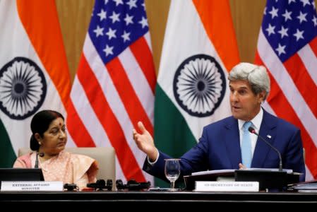 U.S. Secretary of State John Kerry (R) gestures as India's External Affairs Minister Sushma Swaraj looks on during their joint news conference in New Delhi, India, August 30, 2016. REUTERS/Adnan Abidi