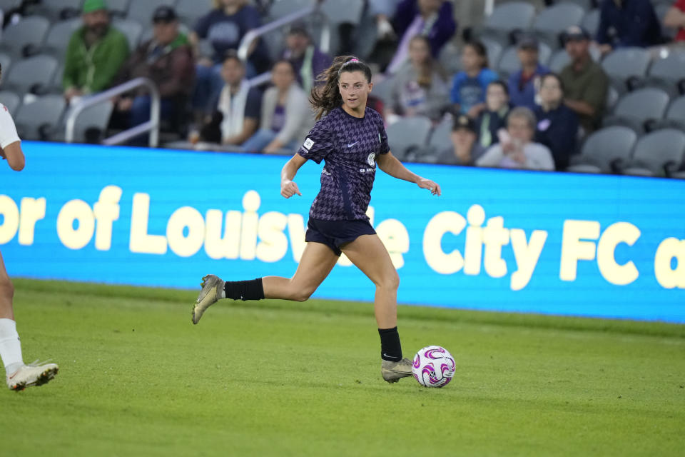 FILE - Racing Louisville FC's Paige Monaghan (5) play during an NWSL soccer match against the Chicago Red Stars, Friday, May 12, 2023, in Louisville, Ky. Louisville will play against North Carolina in the National Women's Soccer League's Challenge Cup title game on Saturday. (AP Photo/AJ Mast, File)