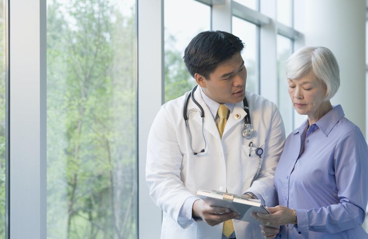 <span class="caption">Over the past couple of decades there has been a shift away from upholding patient autonomy to prioritizing public health. </span> <span class="attribution"><a class="link " href="https://www.gettyimages.com/detail/photo/chinese-doctor-talking-to-woman-royalty-free-image/98818405?adppopup=true" rel="nofollow noopener" target="_blank" data-ylk="slk:Terry Vine/DigitalVision via Getty Images;elm:context_link;itc:0;sec:content-canvas">Terry Vine/DigitalVision via Getty Images</a></span>