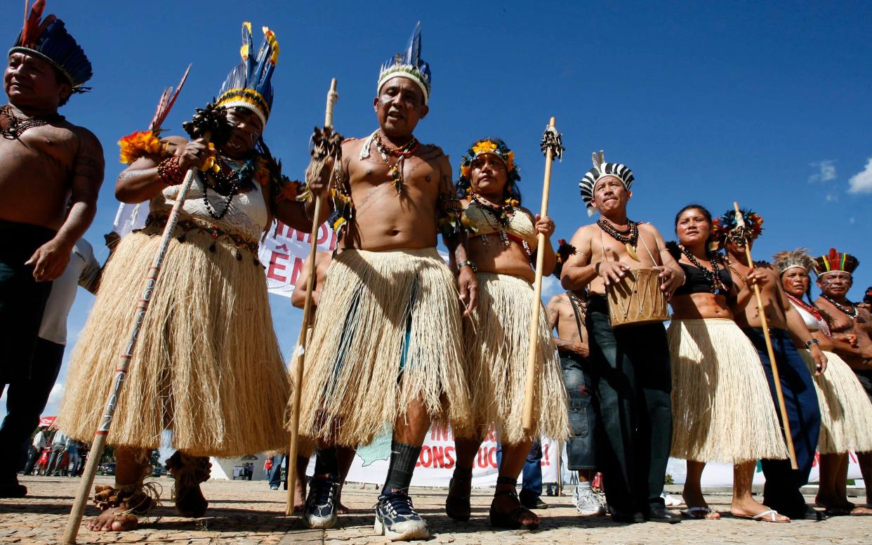 The Yanomami people live on both sides of the Venezuela-Brazil border - AP