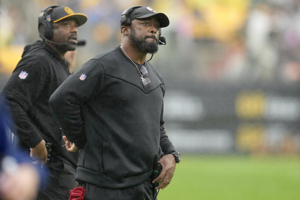 Pittsburgh Steelers head coach Mike Tomlin, right, watches play against the Jacksonville Jaguars during the first half of an NFL football game Sunday, Oct. 29, 2023, in Pittsburgh. (AP Photo/Gene J. Puskar)