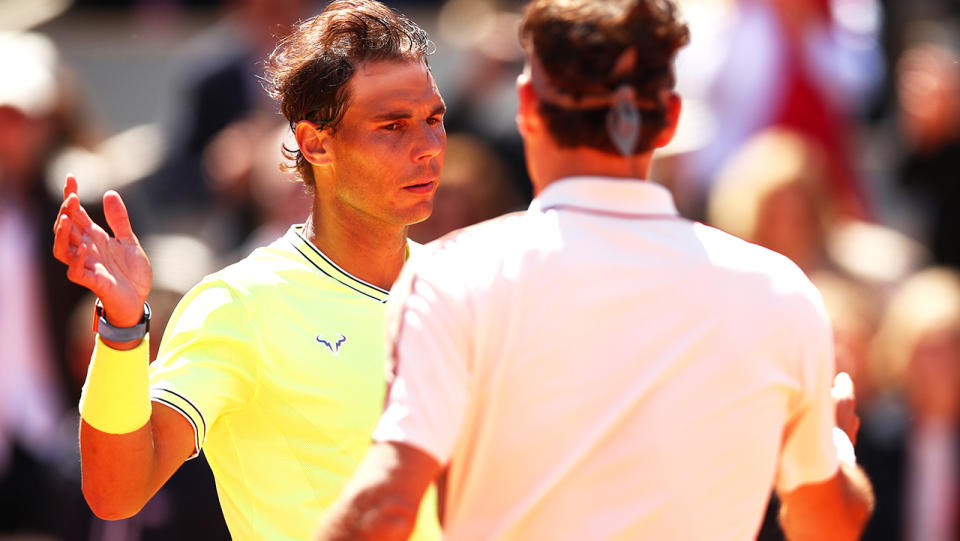 Rafael Nadal and Roger Federer, pictured here after playing at the 2019 French Open.