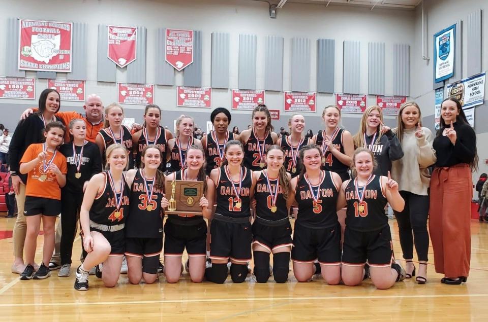 The Dalton High School girls varsity basketball team poses for a photo after winning the district title this spring. Lauran Hicks (far right) has helped coach teams like this one for the past few years.