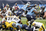 Tennessee Titans running back Derrick Henry (22) dives over the goal line for a touchdown against the Pittsburgh Steelers in the second half of an NFL football game Sunday, Oct. 25, 2020, in Nashville, Tenn. (AP Photo/Mark Zaleski)