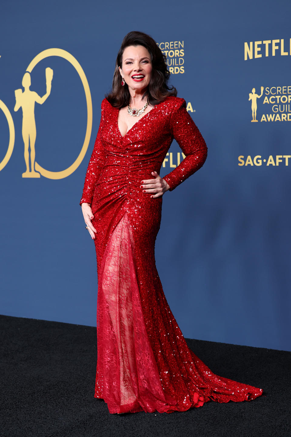 Fran Drescher wwears red sequined ggown at SAG Awards