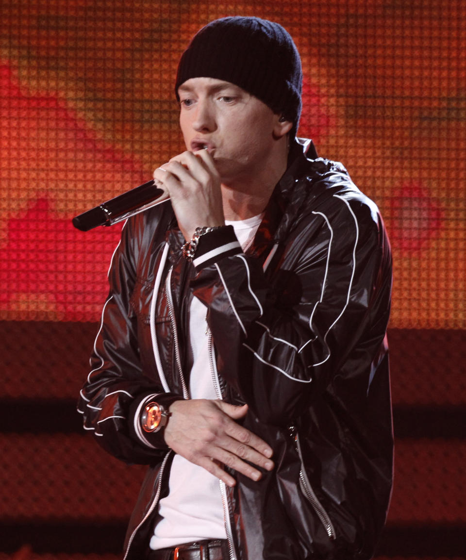 FILE - In this Jan. 31, 2010, file photo, rapper Eminem performs at the Grammy Awards in Los Angeles. Anti-gay sentiments have been entrenched in hip-hop for decades. Eminem, widely known for offensive lyrics toward homosexuals, has joined Jay-Z in saying people of the same-sex should be able to love one another. (AP Photo/Matt Sayles, File)