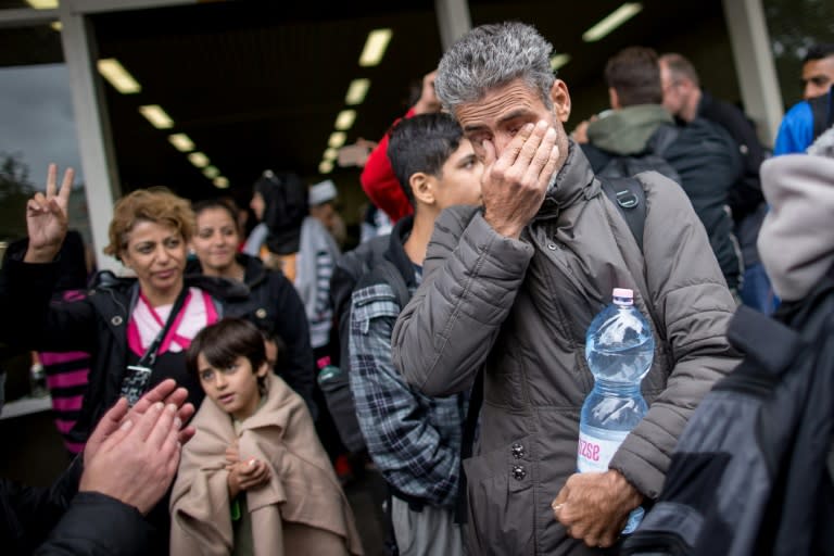 Migrants arrive in Dortmund, western Germany, in September 2015