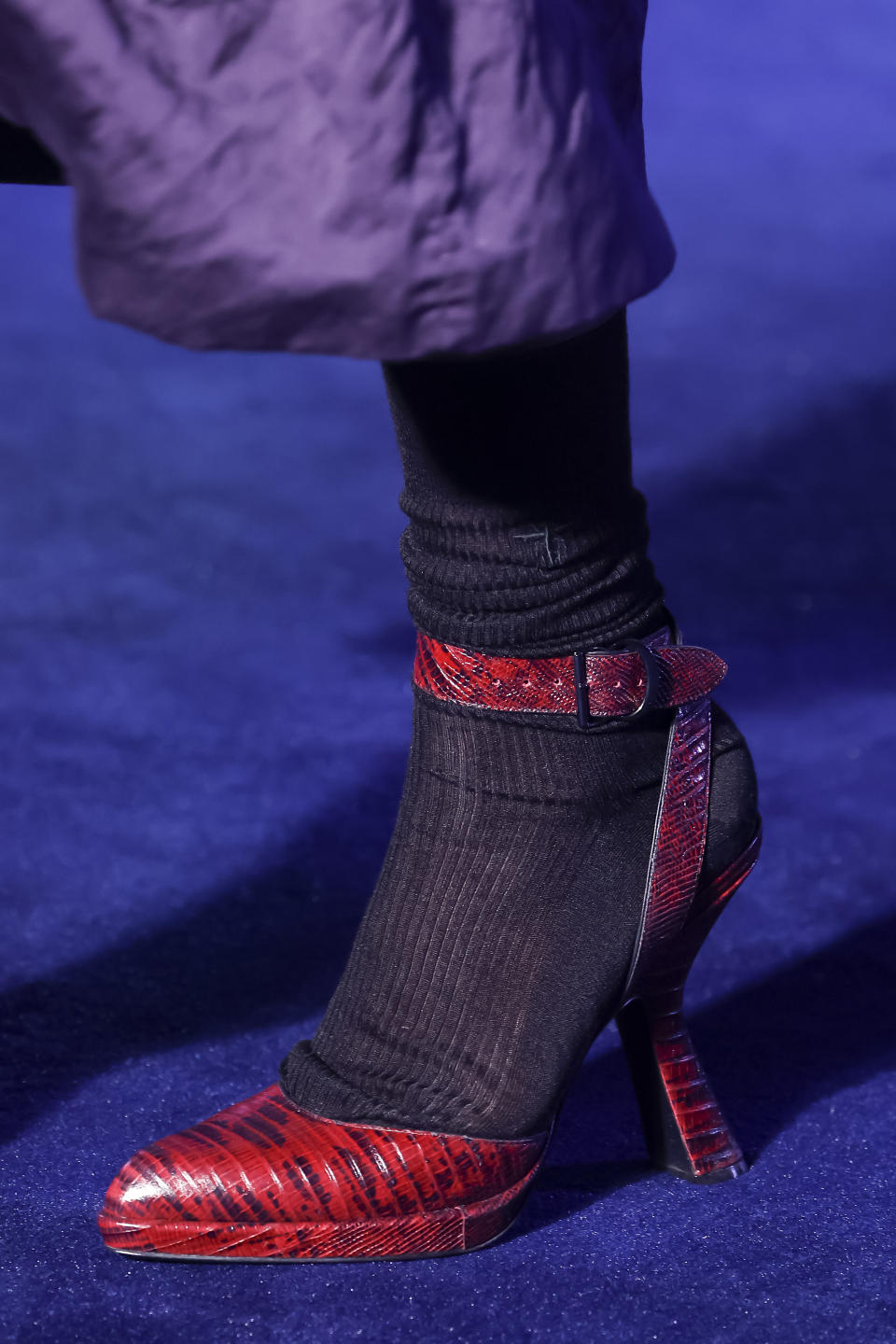 An ankle strap inverted heel pump with socks at Christian Dior fall winter ’23. - Credit: Getty Images