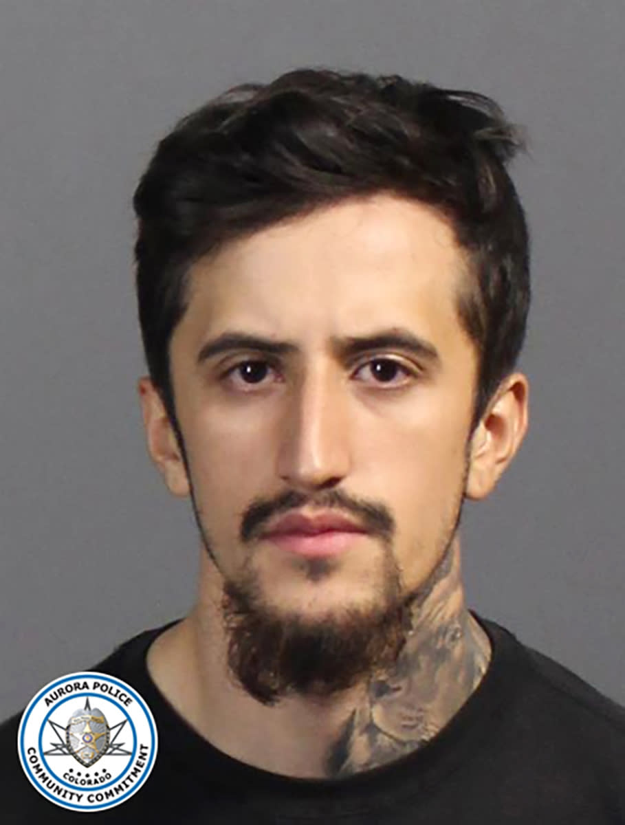 In this undated photo released by the Aurora Police Department is Joseph Mario Castorena. Court records say Castorena who is suspected of killing four people at his ex-girlfriend's home in suburban Denver on Sunday, Oct. 30, 2022, allegedly threatened to kill her a week before. Police were searching Monday, Oct. 31, 2022, for 21-year-old Castorena in connection with the shooting that left three men and a woman dead in Aurora. (Aurora Police Department via AP)