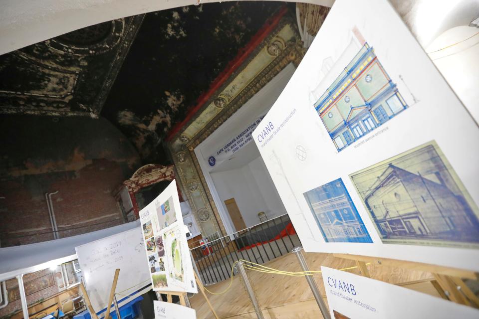 Plans for the restoration of the facade of the former Strand Theater on Acushnet Avenue in New Bedford can be seen on the right.  The theater is now owned by the Cape Verdean Association and soon to be restored and become the Cape Verdean Cultural Center.