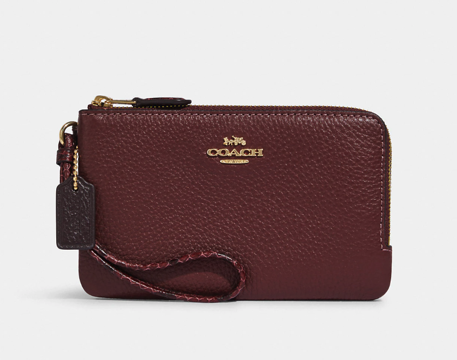 Double Corner Zip Wristlet. Image via Coach Outlet.