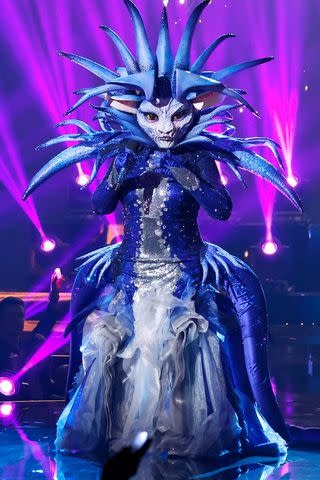 <p>Michael Becker / FOX</p> Sea Queen performing on season 10 of 'The Masked Singer.'