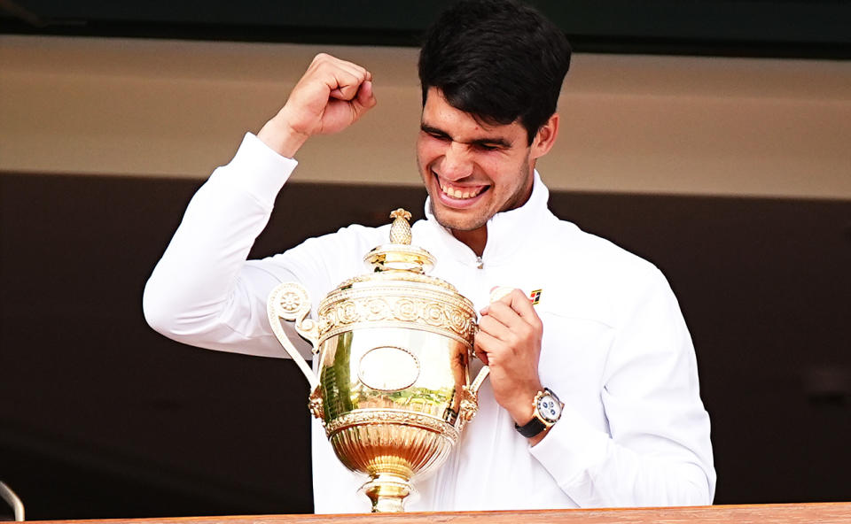 Carlos Alcaraz, pictured here celebrating with the trophy after winning Wimbledon.