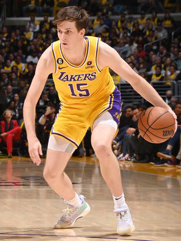 <p>Andrew D. Bernstein/NBAE/Getty</p> Austin Reaves during a game against the Memphis Grizzlies in 2023