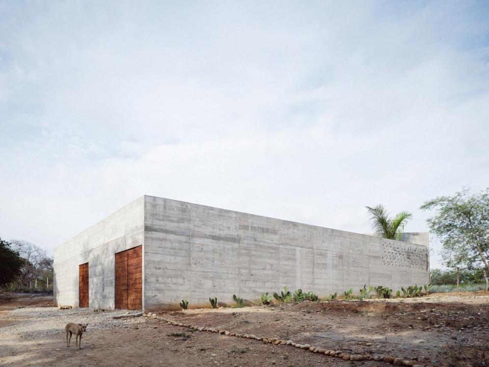 From the outside, the Zicatela House looks like little more than an unforgiving concrete bunker.