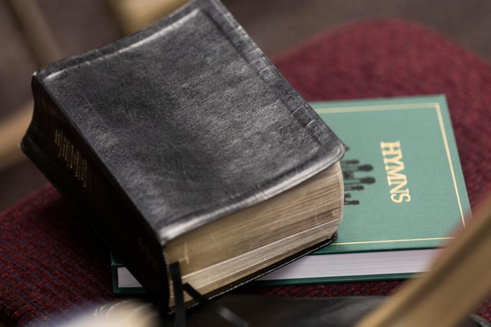 A Bible and a book of hymns rest on chairs as community members and former prison inmates gather to attend a sacrament service of The Church of Jesus Christ of Latter-day Saints in West Valley City on Sunday, Jan. 28, 2024. | Marielle Scott, Deseret News
