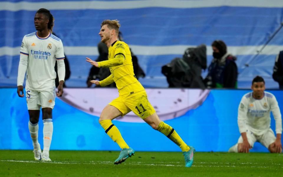 Chelsea's Timo Werner celebrates after he scored his side's third goal during the Champions League, quarterfinal second leg soccer match between Real Madrid and Chelsea at the Santiago Bernabeu stadium in Madrid, Spain, Tuesday, April 12, - AP