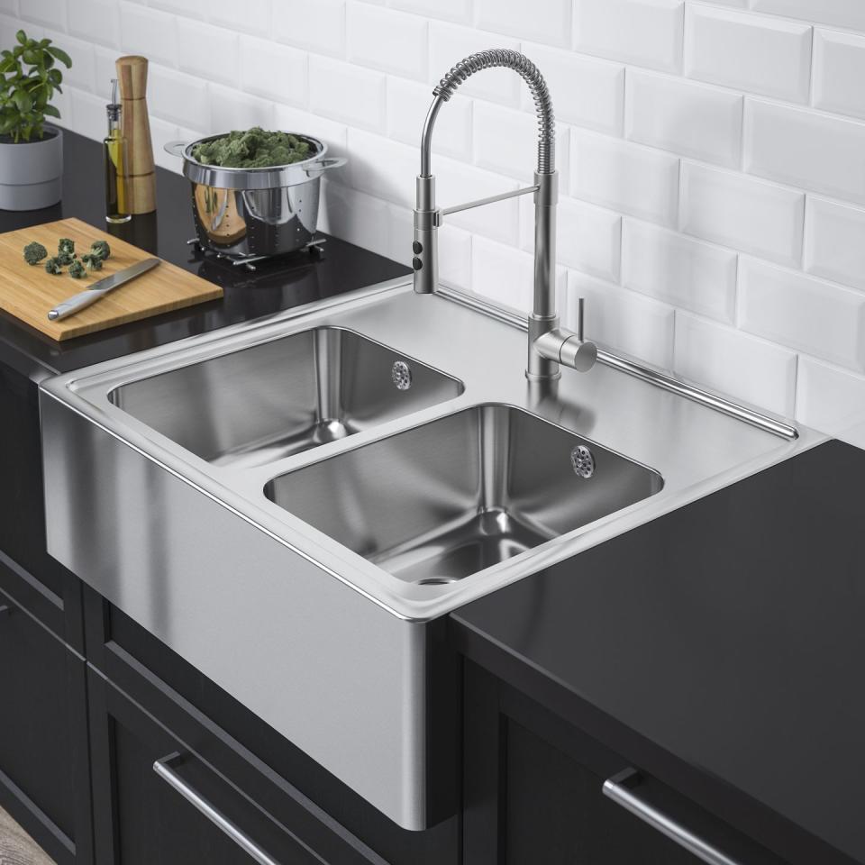 <p>This stainless steel sink, currently on sale with 36 per cent off, boasts two bowls so you can wash and rinse at the same time. It has a deep back edge, a pre-drilled hole for a kitchen mixer tap, and has been made from sound-absorbing material. If you're planning a new kitchen, why not consider this sink to complete the look. </p><p><strong>WAS £499, NOW £330</strong></p><p><a class="link " href="https://www.ikea.com/gb/en/p/bredsjoen-sink-bowl-2-bowls-w-visible-front-stainless-steel-s59289546/" rel="nofollow noopener" target="_blank" data-ylk="slk:BUY NOW;elm:context_link;itc:0;sec:content-canvas">BUY NOW</a></p>