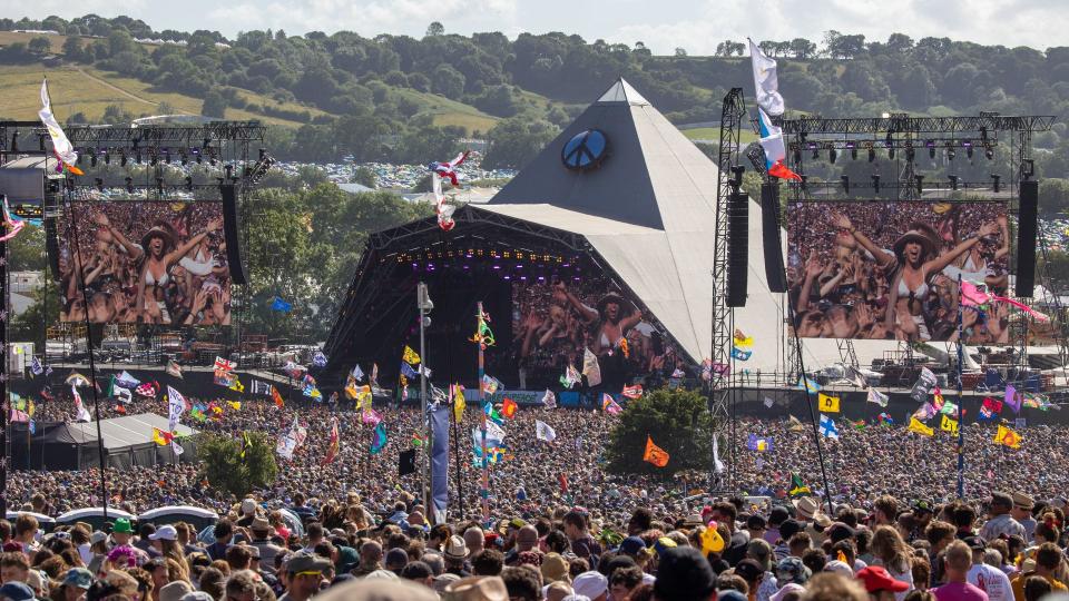 Crowds of people gather in front of the main Pyramid Stage to watch Diana Ross perform at the 2022 Glastonbury Festival