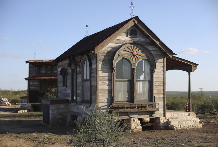 <p>Made from 95 percent salvaged materials, the Arched Zebu is a tiny prairie house from <a href="http://tinytexashouses.com/" rel="nofollow noopener" target="_blank" data-ylk="slk:Tiny Texas Houses;elm:context_link;itc:0;sec:content-canvas" class="link ">Tiny Texas Houses</a>. Measuring 12- by 18-feet, the house is built from materials that are close to 200 years old. Featuring beautiful arched windows, the cottage includes a lofted sleep area, kitchen, and shabby chic details.</p><p><a class="link " href="http://puresalvageliving.com/the-zebu-sisters-home-on-the-prairie-shots/" rel="nofollow noopener" target="_blank" data-ylk="slk:SEE INSIDE;elm:context_link;itc:0;sec:content-canvas">SEE INSIDE</a></p>