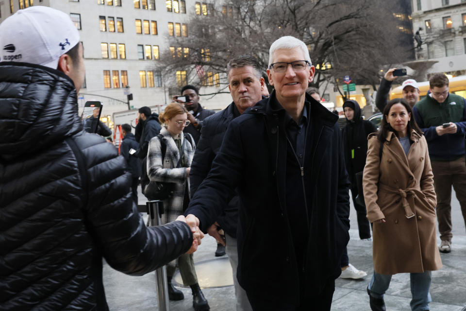 NEW YORK, NEW YORK - FEBRUARY 02: Apple CEO Tim Cook arrives as people stand in line to purchase the Apple Vision Pro headset at the Fifth Avenue Apple store on February 02, 2024 in New York City. Apple CEO Tim Cook and Senior Vice President of Retail and People Deirdre O'Brien were at the opening of the Apple store on Fifth Avenue as the company begins its sale of the Vision Pro headset, the company's first new product in seven years.  (Photo by Michael M. Santiago/Getty Images)