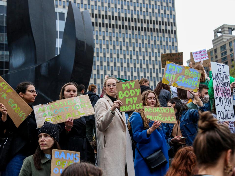 People attend a protest in Manhattan to show support for abortion rights in the United States on May 3, 2022.