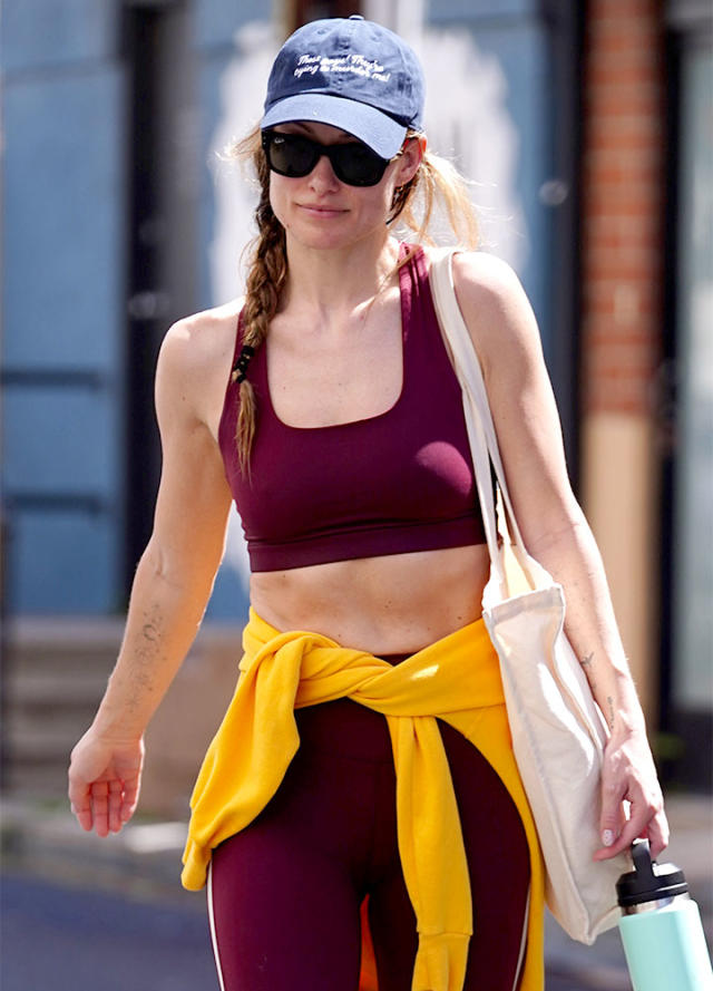 Olivia Wilde looks incredible in a red sports bra with matching
