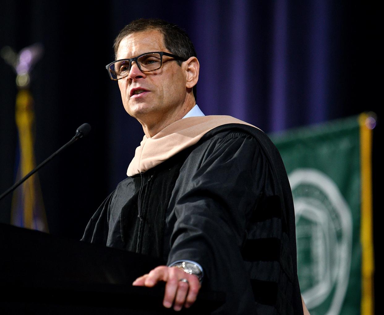 Boston Bruins general manager Donald Sweeney gives the address at the Nichols College commencement ceremony Saturday at the DCU Center.