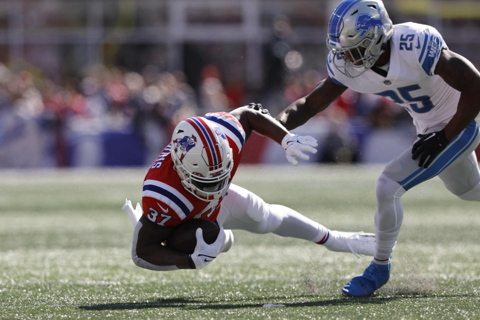 New England Patriots running back Damien Harris (37) is brought down by Detroit Lions safety Will Harris (25) during the first half of an NFL football game, Sunday, Oct. 9, 2022, in Foxborough, Mass. (AP Photo/Michael Dwyer)