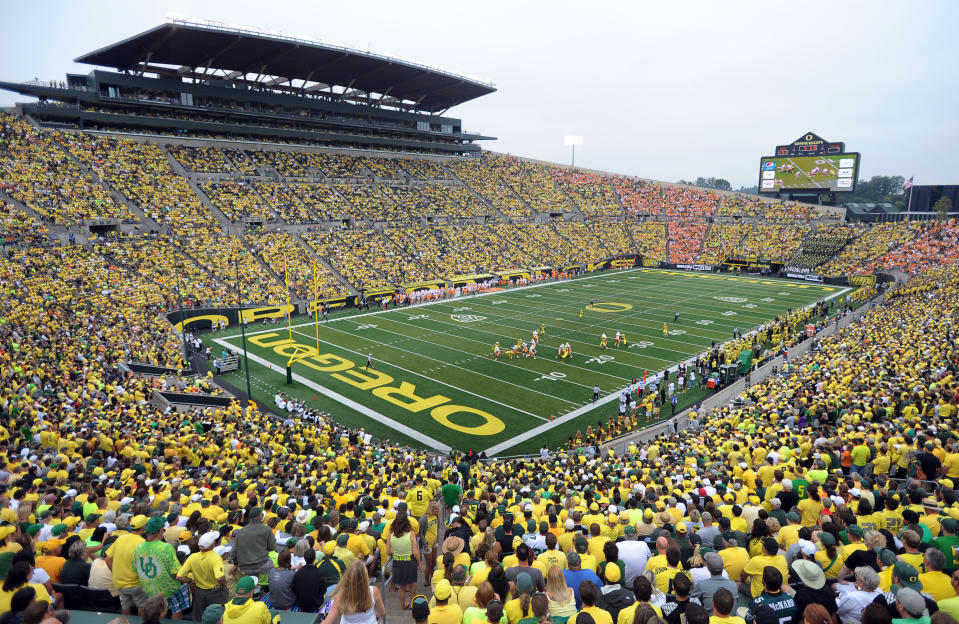 A general view of the crowd at Autzen Stadium during the third quarter of the NCAA college football game between the Oregon and the Tennessee in Eugene, Ore., Saturday, Sept. 14, 2013. Oregon won the game 59-14. (AP Photo/Steve Dykes)