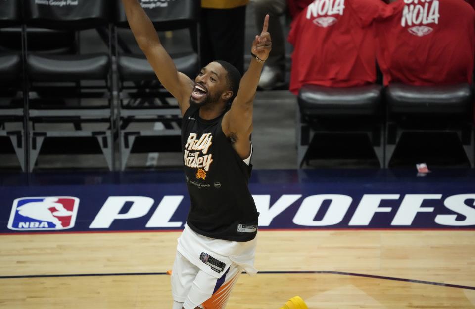 Apr 22, 2022; New Orleans, Louisiana, U.S.;  Phoenix Suns forward Mikal Bridges (25) jokes around before Game 3 of the Western Conference playoffs against the New Orleans Pelicans.