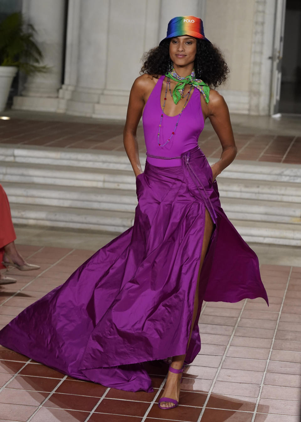 A model walks the runway at the Ralph Lauren Spring 2023 Fashion Experience on Thursday, Oct. 13, 2022, at The Huntington in Pasadena, Calif. (AP Photo/Chris Pizzello)