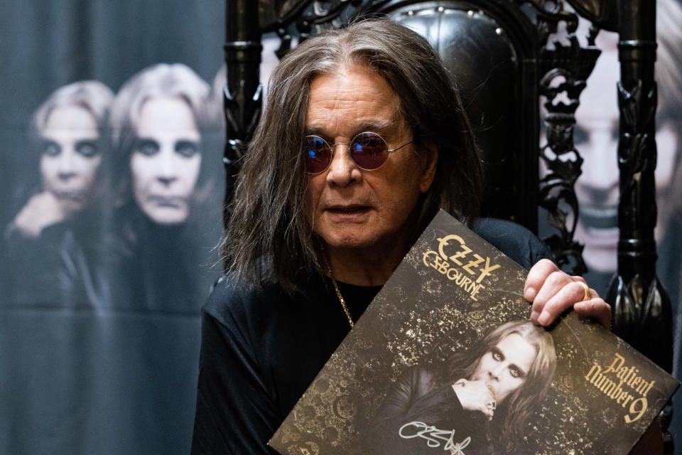 LONG BEACH, CALIFORNIA - SEPTEMBER 10: Musician Ozzy Osbourne signs copies of his album 